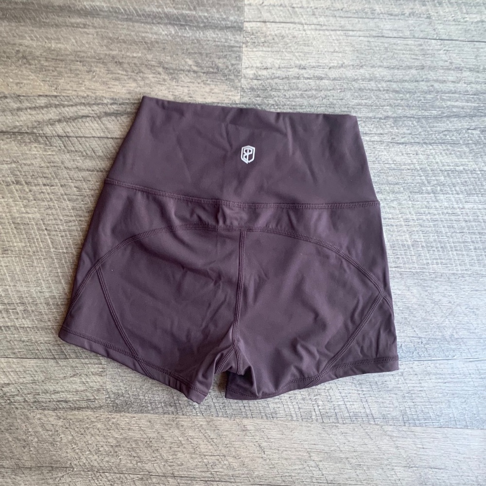 Born primitive your go to booty shorts plum